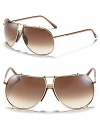 Tom Ford's sleek aviator sunglasses are a must-have for timeless wear.
