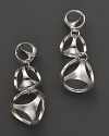 Bold sterling silver earrings showcase Di MODOLO's unique Triadra cages.