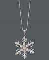 'Tis the season to let it snow! This unique snowflake-shaped pendant features a round-cut diamond accent at center. Crafted in sterling silver with 14k rose gold accents. Approximate length: 18 inches. Approximate drop: 1 inch x 3/4 inch.