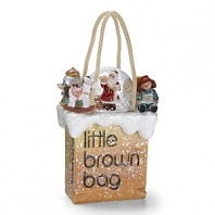 Santa reviews his nice list surrounded by toys, all atop the iconic little brown bag decked in glittering snow.