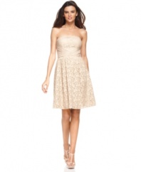 A classic look that's also completely on-trend: Vince Camuto's strapless dress mingles lace with pleated details for a beautiful feminine effect.