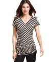 Chevron stripes add a graphic appeal to this Studio M top, perfect for a pop of print!