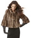 A vintage-inspired silhouette and luxe faux fur combine to create INC's wildly chic topper.