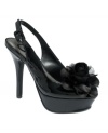 G by Guess's Namie platform pumps feature a fancy floral accent on the vamp that makes them sexy, yet sweet.
