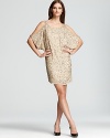 Keep things simple and opt for a beaded and sequined shirt dress--short, smart and absolutely gorgeous. Split dolman sleeves add edge to this look, which needs nothing more than a pair of soaring metallic platforms.