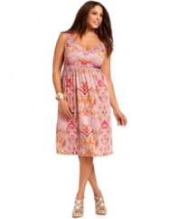 Look pretty in paisley with INC's sleeveless plus size dress, elegantly defined by an empire waist.