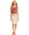 Exposed zippers add edge to this MICHAEL Michael Kors pencil skirt -- a stylish spin on a workwear staple!