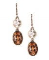With glittering crystals in clear and rich golden brown hues, Givenchy's double-drop baguette earrings will be an attractive accompaniment for your fall wardrobe. Crafted in gold tone mixed metal. Approximate drop: 2 inches.