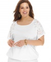 Feminine frills beautifully finish Jones New York Signature's short sleeve plus size top-- complete the look with your favorite casual bottoms.