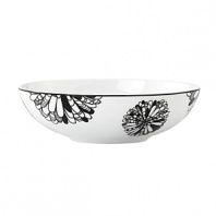 This easy-to-mix-and-match fruit bowl from kate spade new york features a striking illustration of dogwood flowers, artfully and imaginatively rendered in black and white to liven up your table.