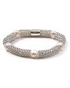 Make a bubbly statement with this sterling silver and pearl bracelet from Links of London. A cool option come party time, this bauble lends a shot of sparkle to your favorite cocktail mini.
