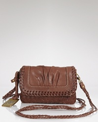 Compact style goes rugged with this Western-inspired crossbody bag from Frye. In rich leather with braided detailing, it's a perfect partner for pared down denim.