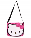 Long-distance style. The cute looks of this messenger bag from Hello Kitty will carry her look through her many travels.