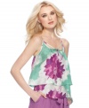 An oversized floral print adds bold color to this floaty MM Couture tank -- perfect over the season's skinny jeans & shorts!