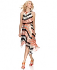Jessica Simpson's dress is prepped for spring occasions with a striped print highlighted by a pop of peachy hue. The braided belt gives it a blouson-style fit at the bodice that's totally on-trend for the season.