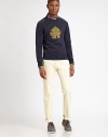 Be the center of attention in this classic crewneck, handsomely woven in soft cotton, with leaf print design.CrewneckRibbed knit collar, cuffs and hemCottonDry cleanImported