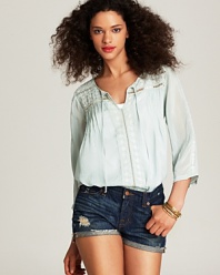 Perfect the pretty peasant look in this delicately detailed semi-sheer Johnny Was Collection tunic.
