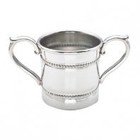 Designed with double bands of beads, this Reed & Barton baby cup has two handles for a child's easy drinking. Crafted in tarnish-resistant pewter, it offers classic good looks.
