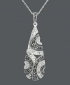 Add a touch of contrast in swirls of sparkle. Genevieve & Grace teardrop pendant features round-cut crystals and glittering marcasite in a sterling silver setting. Approximate length: 18 inches. Approximate drop: 2-1/8 inches.