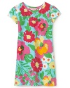 Overlapping flowers in oversaturated hues evoke a retro sensibility in Lilly Pulitzer's Little Kelsea dress.