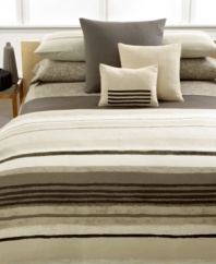 Layer your bed in plush texture with this coverlet from Calvin Klein, boasting a sumptuous quilted pattern in a rich brown solid.
