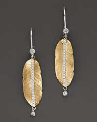 Shining gold leaves, set with sparkling diamonds, evoke early autumn mornings.