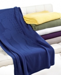 Take the Lacoste knit cotton throw to the bed, couch, porch – anywhere you want to kick back and relax. In solid colors to easily coordinate with Lacoste bedding collections.