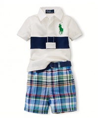 A heritage-inspired set pairs a short-sleeved pieced cotton rugby finished with signature Big Pony embroidery and an adorably preppy plaid short with a webbed cotton belt.