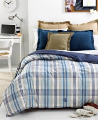 Lounge in style. Featuring a classic plaid in shades of sky and sun, this Lauren Ralph Lauren down-alternative comforter warms up your nights (and days) with preppy polish. Features an embroidered Lauren Ralph Lauren monogram at the base. Reverses to solid navy. Finished with stitched edges.