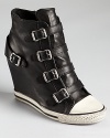 With pre-distressed details, the United Buckled sneaker wedges are made for kicking around in style. From Ash.