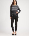 Array of bold, tonal stripes and long dolman sleeves invigorate this sophisticated, wool-blend boatneck. BoatneckDropped shouldersLong dolman sleevesLonger length hits below the hips55% merino wool/25% viscose/20% nylonDry cleanImportedModel shown is 5'10 (177cm) wearing US size Small.