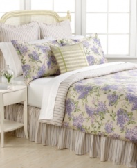 Spring into style! Evoking a distinct countryside feel, this Cape Elizabeth comforter set from Lauren Ralph Lauren features a garden of lilacs in a natural palette of purple, green and tan. Reverses to a chic stripe pattern.