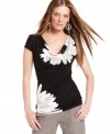 INC's petite cowl-neck top gets an upgrade! The over-sized graphic floral-print creates a chic effect.