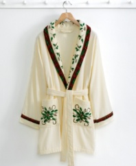 Wear your spirit on your sleeve. Spread holiday cheer throughout your home by wearing this plush cotton robe from Lenox, featuring a festive holly motif and gold accents for a touch of sparkle. (Clearance)