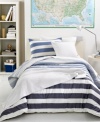 Give your bed a modern makeover with this Concordia Ice comforter set, featuring broad stripes in pale to dark blue hues and alternating white layers. Polished & preppy. It's classic Lacoste.
