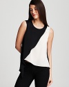 The utilitarian city wardrobe gets artistic reimagining with this DKNY tank, touting asymmetric color blocking in bold black and white for real modern edge.