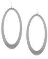 Shapely statement makers. The smooth oval design of Jessica Simpson's large drop earrings make them an intriguing addition to your jewelry collection. Crafted in silver-plated mixed metal on ear wire. Approximate drop: 4 inches. Approximate diameter: 1-3/4 inches.