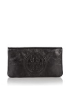 Tory Burch's iconic Reva clutch in luxurious bombe leather.