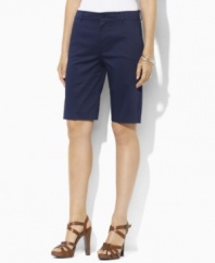 Designed for a flattering, slimming fit from lustrous stretch cotton sateen, these chic Lauren by Ralph Lauren Bermuda shorts are the epitome of timeless, preppy style.