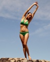 A sexy macrame-braided trim gives this bikini bottom a Brasilian-inspired look, from Hermanny by Vix.