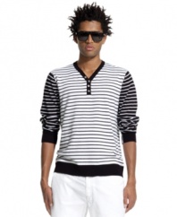 Follow the lines toward this lightweight, laid-back striped sweater from Bar III.