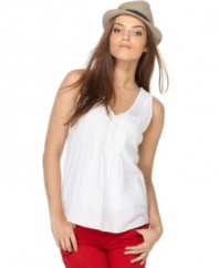 Brighten up for summer in Calvin Klein Jeans' must-have sleeveless tank top, made in an ultralight cotton fabric blend.