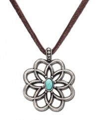 Worn long or wrapped up short, this Lucky Brand necklace adds the perfect amount of rugged charm to any look. Flower pendant carved in worn silver tone mixed metal with semi-precious reconstituted calcite turquoise stone at center of petals. Suspended from brown cord. Approximate length: 34 inches. Approximate drop: 2 inches.