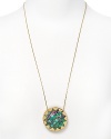 Add a hippie-chic accent to your look with this bold abalone sunburst pendant from House of Harlow 1960.