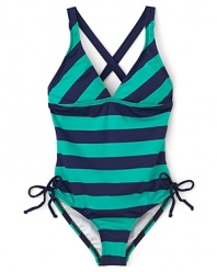French Riviera-inspired stripes make a bold statement in Juicy Couture's V neck swimsuit.