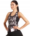 Sporty gets stylish in this great tank top from Ideology. A built-in shelf bra offers support for low-impact workouts, while the printed design lends a fashionable touch to the gym.