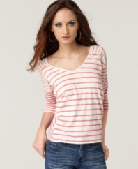 Sporty stripes adorn this top from Calvin Klein Jeans for essential springtime style. Pair it with jeans and sneakers for a weekend look that stays put-together!
