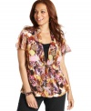 Team your favorite neutral bottoms with Elementz' short sleeve plus size top, highlighted by a striking print!