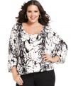 Featuring a snakeskin print, Seven7 Jeans' three-quarter sleeve plus size top is a must-get for the season!