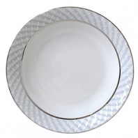 Carefully rendered in a style reminiscent of neoclassic trompe l'oeil-a French term for artwork that depicts optical illusions-a captivating geometric rosette motif traverses this elegant porcelain vegetable dish from Bernardaud. Delicate shades of ice blue, mother-of-pearl and gray are enhanced by a fine platinum trim.